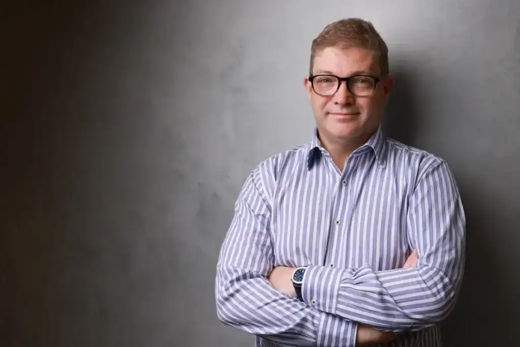 Experienced spine specialist Dr Jacob Fairhall in professional portrait.